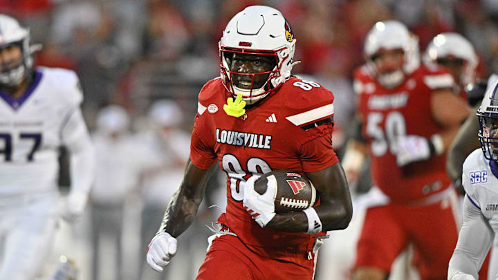 Sep 5, 2025; Louisville, Kentucky, USA;  Louisville Cardinals tight end Jaleel Skinner (88) runs the ball against the James Madison Dukes during the first half at L&N Federal Credit Union Stadium. Louisville defeated James Madison 28-14. Mandatory Credit: Jamie Rhodes-Imagn Images