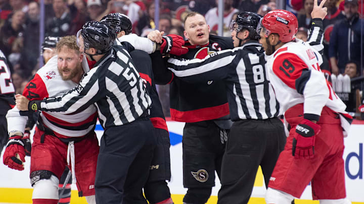 Apr 25, 2026; Ottawa, Ontario, CAN; Tensions rise as Carolina Hurricanes left wing Nicolas Deslauriers (44) fights with Ottawa Senators left wing Brady Tkachuk (7) in the second period of game four of the first round of the 2026 Stanley Cup Playoffs at the Canadian Tire Centre. Mandatory Credit: Marc DesRosiers-Imagn
