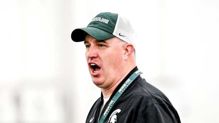 Michigan State's head coach Pat Fitzgerald calls out to players during spring football practice on Tuesday, April 14, 2026, in East Lansing.