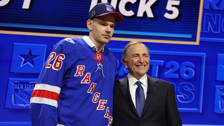 Jun 26, 2026; Buffalo, New York, USA; Alberts Smits reacts beside NHL commissioner Gary Bettman after being selected with the fifth pick in the first round of the 2026 NHL Draft by the New York Rangers at KeyBank Center. Mandatory Credit: Timothy T. Ludwig-Imagn Images Jun 26, 2026; Buffalo, New York, USA; Alberts Smits reacts beside NHL commissioner Gary Bettman after being selected with the fifth pick in the first round of the 2026 NHL Draft by the New York Rangers at KeyBank Center. Mandatory Credit: Timothy T. Ludwig-Imagn Images