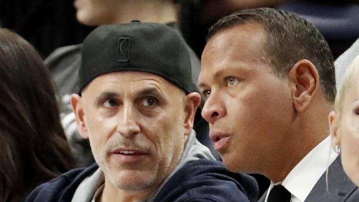 Apr 14, 2024; Minneapolis, Minnesota, USA; Minnesota Timberwolves and Lynx minority owners Marc Lore and Alex Rodriguez talk in the fourth quarter of the game against the Phoenix Suns at Target Center. Mandatory Credit: Bruce Kluckhohn-Imagn Images