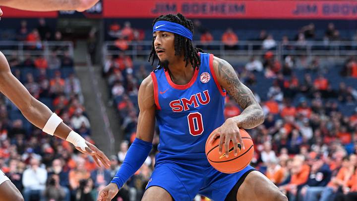 Feb 14, 2026; Syracuse, New York, USA; Southern Methodist University Mustangs guard B.J. Edwards (0) handles the ball in the first half against the Syracuse Orange at the JMA Wireless Dome. Mandatory Credit: Mark Konezny-Imagn Images Feb 14, 2026; Syracuse, New York, USA; Southern Methodist University Mustangs guard B.J. Edwards (0) handles the ball in the first half against the Syracuse Orange at the JMA Wireless Dome. Mandatory Credit: Mark Konezny-Imagn Images