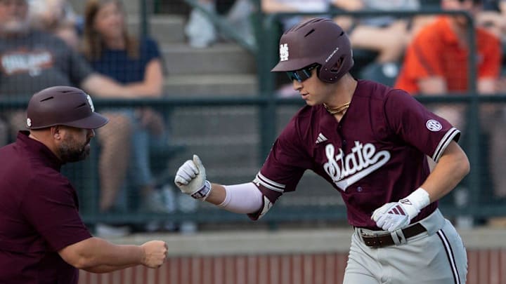 Mississippi State Bulldogs' Ace Reese (3) celebrates his home run against the Auburn Tigers at Plainsman Park in Auburn, Ala.