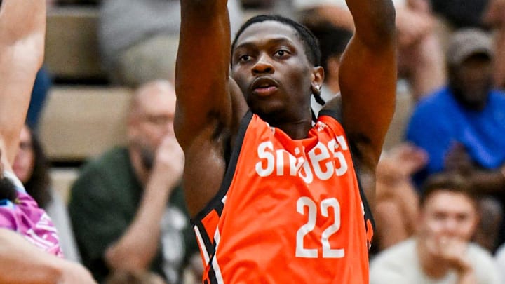 Team Snipes and Michigan State's Trey Fort, right, makes a 3-pointer against Team Tri-Star during the Moneyball Pro-Am on Tuesday, June 24, 2025, at Holt High School.