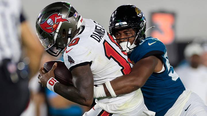 Jacksonville Jaguars defensive end Bryan Thomas Jr. (57) tallies a sack on Tampa Bay Buccaneers quarterback Jalon Daniels (10) during the second quarter of an NFL preseason football matchup at EverBank Stadum on Friday, Aug. 28, 2026 in Jacksonville, Fla. [Corey Perrine/Florida Times-Union]