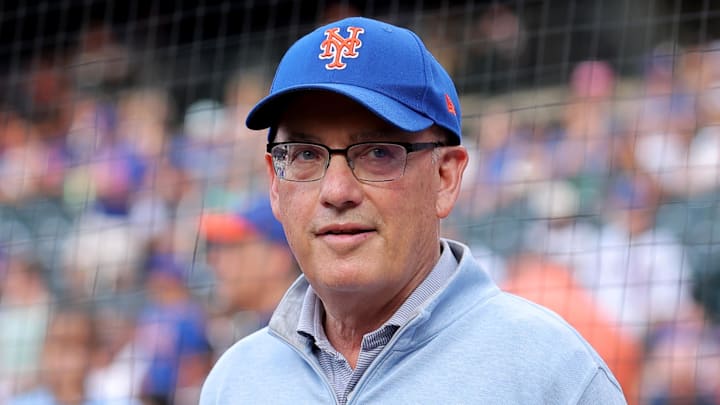 Aug 14, 2025; New York City, New York, USA; New York Mets owner Steve Cohen stands on the field before a ceremony to honor first baseman Pete Alonso (not pictured) for breaking the Mets all time home run record before a game against the Atlanta Braves at Citi Field. Mandatory Credit: Brad Penner-Imagn Images