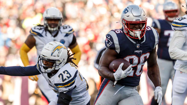 Jan 13, 2019; Foxborough, MA, New England Patriots running back Sony Michel (26) runs the ball against the Los Angeles Chargers in an AFC Divisional playoff football game at Gillette Stadium. Mandatory Credit: David Butler II-Imagn Images