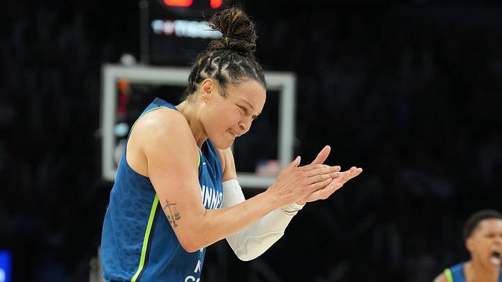 Jul 6, 2026; Minneapolis, Minnesota, USA; Minnesota Lynx guard Kayla McBride (21) claps her hands after making a three point shot against the Connecticut Sun in the first half at Target Center. Mandatory Credit: Jesse Johnson-Imagn Images