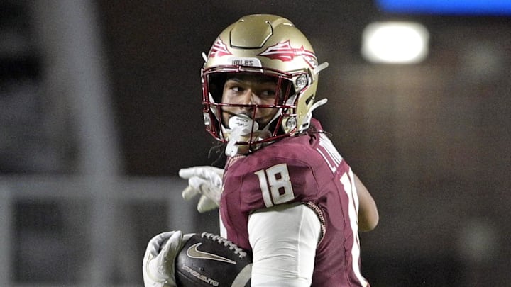 Oct 5, 2024; Tallahassee, Florida, USA; Florida State Seminoles tight end Landen Thomas (18) runs the ball against the Clemson Tigers during the second half at Doak S. Campbell Stadium. Mandatory Credit: Melina Myers-Imagn Images
