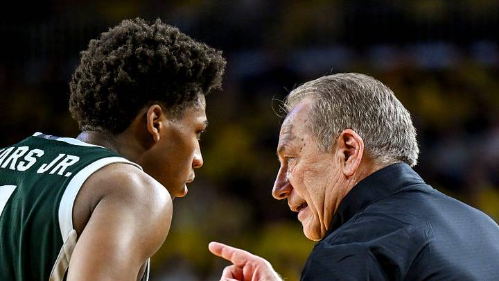 Michigan State's head coach Tom Izzo, right, talks with Jeremy Fears Jr. during the second half against Michigan on Sunday, March 8, 2026, at the Crisler Center in Ann Arbor.
