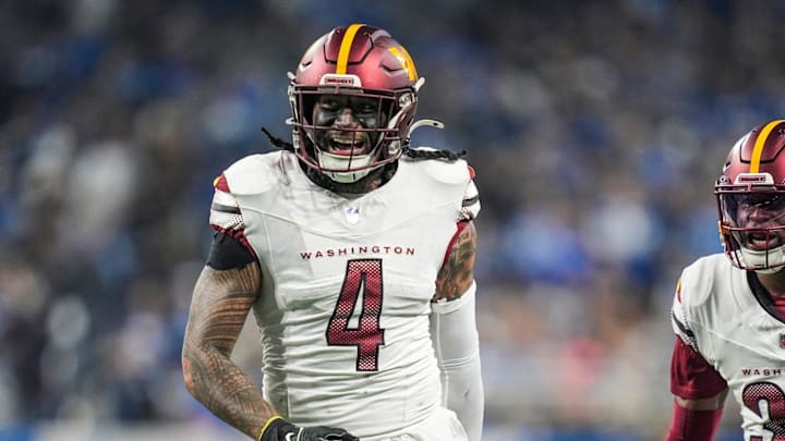 Washington Commanders linebacker Frankie Luvu (4) smiles after a play in the first half against the Detroit Lions in the NFC divisional round at Ford Field in Detroit on Saturday, Jan. 18, 2025.