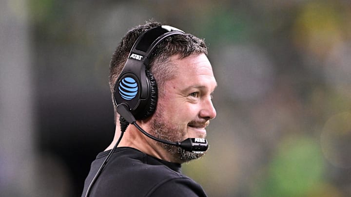 Dec 20, 2025; Eugene, OR, USA; Oregon Ducks head coach Dan Lanning smiles during the third quarter against the James Madison Dukes at Autzen Stadium. Mandatory Credit: Craig Strobeck-Imagn Images Dec 20, 2025; Eugene, OR, USA; Oregon Ducks head coach Dan Lanning smiles during the third quarter against the James Madison Dukes at Autzen Stadium. Mandatory Credit: Craig Strobeck-Imagn Images