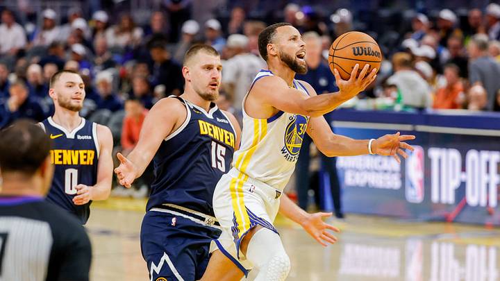 Oct 23, 2025; San Francisco, California, USA; Golden State Warriors guard Stephen Curry (30) goes up for a shot as Denver Nuggets center Nikola Jokić (15) trails on the play during the third quarter at Chase Center. Mandatory Credit: Bob Kupbens-Imagn Images Oct 23, 2025; San Francisco, California, USA; Golden State Warriors guard Stephen Curry (30) goes up for a shot as Denver Nuggets center Nikola Jokić (15) trails on the play during the third quarter at Chase Center. Mandatory Credit: Bob Kupbens-Imagn Images