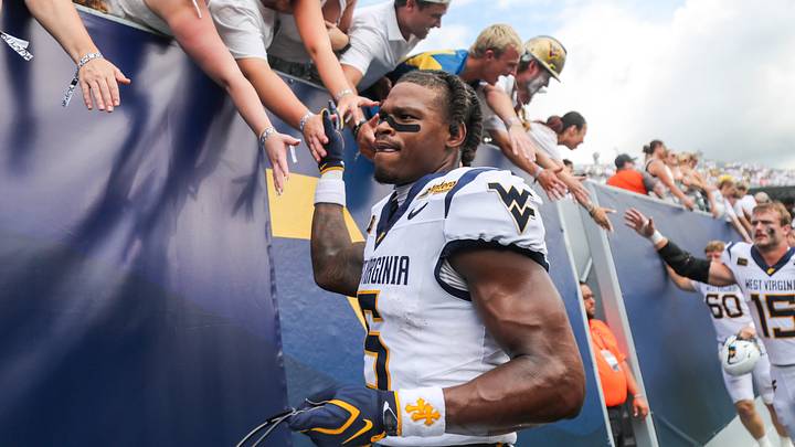 Sep 5, 2026; Morgantown, West Virginia, USA; West Virginia Mountaineers wide receiver Jaden Bray (5) celebrates with fans after defeating the Coastal Carolina Chanticleers at Milan Puskar Stadium. Mandatory Credit: Ben Queen-Imagn Images Sep 5, 2026; Morgantown, West Virginia, USA; West Virginia Mountaineers wide receiver Jaden Bray (5) celebrates with fans after defeating the Coastal Carolina Chanticleers at Milan Puskar Stadium. Mandatory Credit: Ben Queen-Imagn Images