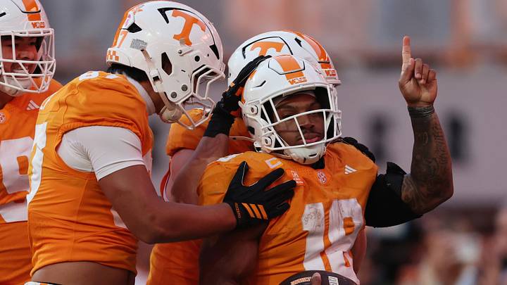 Oct 17, 2026; Knoxville, Tennessee, USA;  Tennessee Volunteers running back DeSean Bishop (18) celebrates with teammates after scoring a touchdown against the Alabama Crimson Tide during the second half at Neyland Stadium.  Mandatory Credit: Randy Sartin-Imagn Images