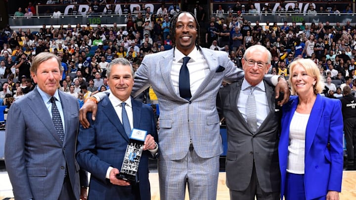 Former Orlando Magic center Dwight Howard celebrates being inducted into the team's Hall of Fame.