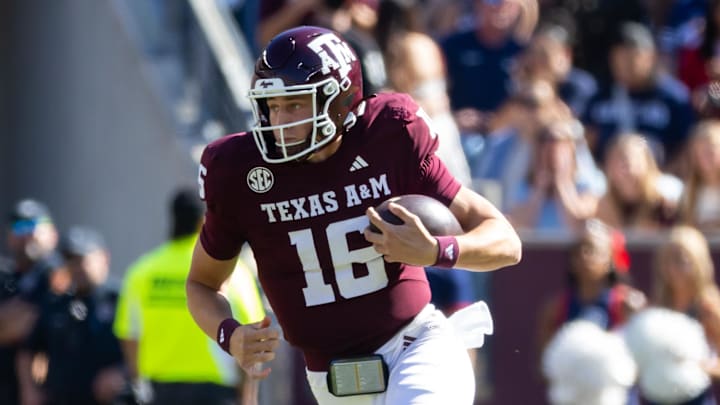 Nov 22, 2025; College Station, Texas, USA; Texas A&M Aggies quarterback Miles O'Neill (16) runs with the ball in the first half of game against the Samford Bulldogs at Kyle Field. Mandatory Credit: Joseph Buvid-Imagn Images