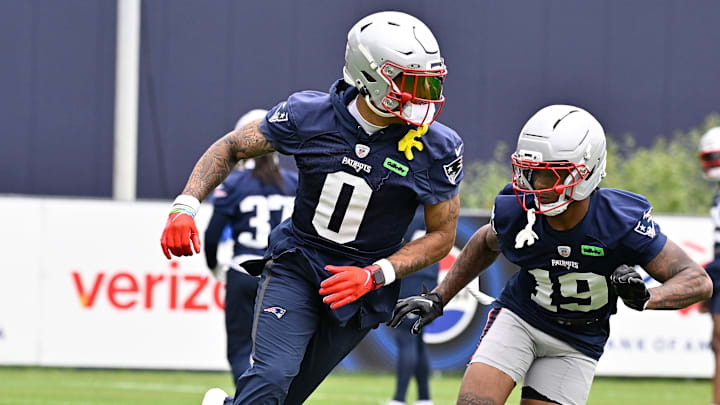 Jun 9, 2025; Foxborough, MA, USA; New England Patriots cornerback Christian Gonzalez (0) and cornerback Kobee Minor (19) run a drill during minicamp at Gillette Stadium. Mandatory Credit: Eric Canha-Imagn Images Jun 9, 2025; Foxborough, MA, USA; New England Patriots cornerback Christian Gonzalez (0) and cornerback Kobee Minor (19) run a drill during minicamp at Gillette Stadium. Mandatory Credit: Eric Canha-Imagn Images