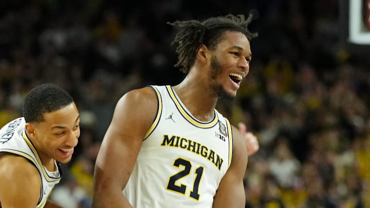 Apr 6, 2026; Indianapolis, IN, USA; Michigan Wolverines forward Morez Johnson Jr. (21) and guard Nimari Burnett (4) celebrate after their win against the UConn Huskies in the national championship of the Final Four of the men's 2026 NCAA Tournament between the and the Michigan Wolverines at Lucas Oil Stadium. Mandatory Credit: Bob Donnan-Imagn Images Apr 6, 2026; Indianapolis, IN, USA; Michigan Wolverines forward Morez Johnson Jr. (21) and guard Nimari Burnett (4) celebrate after their win against the UConn Huskies in the national championship of the Final Four of the men's 2026 NCAA Tournament between the and the Michigan Wolverines at Lucas Oil Stadium. Mandatory Credit: Bob Donnan-Imagn Images