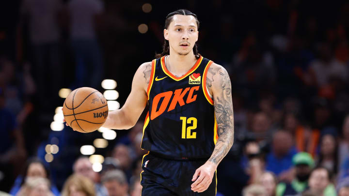 Apr 14, 2024; Oklahoma City, Oklahoma, USA; Oklahoma City Thunder forward Lindy Waters III (12) dribbles the ball down the court against the Dallas Mavericks during the second half at Paycom Center. Mandatory Credit: Alonzo Adams-USA TODAY Sports Apr 14, 2024; Oklahoma City, Oklahoma, USA; Oklahoma City Thunder forward Lindy Waters III (12) dribbles the ball down the court against the Dallas Mavericks during the second half at Paycom Center. Mandatory Credit: Alonzo Adams-USA TODAY Sports