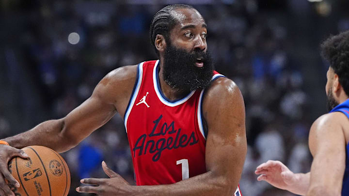 May 3, 2025; Denver, Colorado, USA; LA Clippers guard James Harden (1) prepares to pass the ball in the second quarter against the Denver Nuggets during game seven of first round for the 2025 NBA Playoffs at Ball Arena. Mandatory Credit: Ron Chenoy-Imagn Images