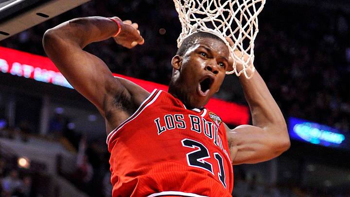 Mar 12, 2012; Chicago, IL, USA; Chicago Bulls guard Jimmy Butler (21) reacts after dunking the ball against the New York Knicks during the second half at the United Center. The Bulls defeat the Knicks 104-99. Mandatory Credit: Mike DiNovo-USA TODAY Sports Mar 12, 2012; Chicago, IL, USA; Chicago Bulls guard Jimmy Butler (21) reacts after dunking the ball against the New York Knicks during the second half at the United Center. The Bulls defeat the Knicks 104-99. Mandatory Credit: Mike DiNovo-USA TODAY Sports