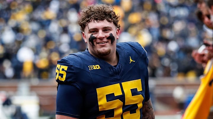 Blue Team defensive lineman Mason Graham (55) walks up the tunnel for halftime during the spring game at Michigan Stadium in Ann Arbor on Saturday, April 20, 2024. Blue Team defensive lineman Mason Graham (55) walks up the tunnel for halftime during the spring game at Michigan Stadium in Ann Arbor on Saturday, April 20, 2024.