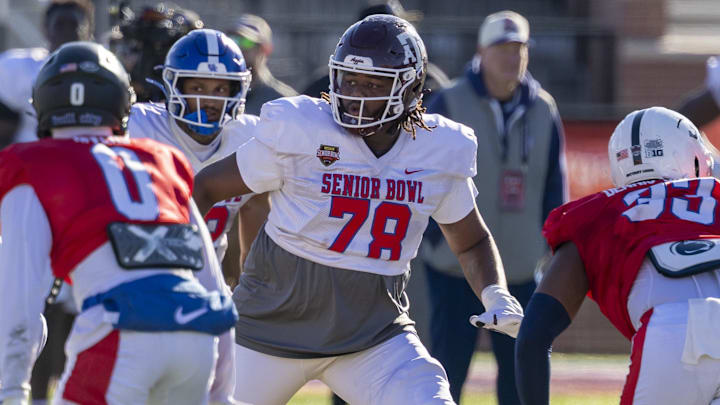 National Team offensive lineman Dametrious Crownover (78) of Texas A&M looks for a block during National Senior Bowl practice. National Team offensive lineman Dametrious Crownover (78) of Texas A&M looks for a block during National Senior Bowl practice.