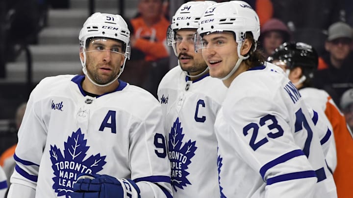 Jan 7, 2025; Philadelphia, Pennsylvania, USA; Toronto Maple Leafs center John Tavares (91), center Auston Matthews (34) and left wing Matthew Knies (23) against the Philadelphia Flyers  at Wells Fargo Center. Mandatory Credit: Eric Hartline-Imagn Images