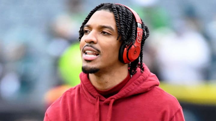 Jan 26, 2025; Philadelphia, PA, USA; Washington Commanders quarterback Jayden Daniels (5) looks on before the NFC Championship game at Lincoln Financial Field. Mandatory Credit: Eric Hartline-Imagn Images