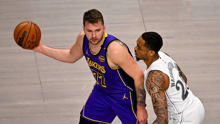 Apr 9, 2025; Dallas, Texas, USA; Los Angeles Lakers guard Luka Doncic (77) looks to pass the ball by Dallas Mavericks forward P.J. Washington (25) during the first quarter at the American Airlines Center. Mandatory Credit: Jerome Miron-Imagn Images Apr 9, 2025; Dallas, Texas, USA; Los Angeles Lakers guard Luka Doncic (77) looks to pass the ball by Dallas Mavericks forward P.J. Washington (25) during the first quarter at the American Airlines Center. Mandatory Credit: Jerome Miron-Imagn Images