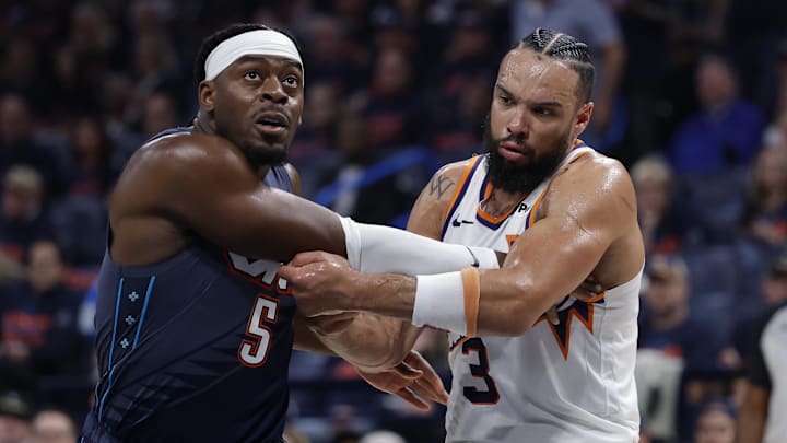 Apr 22, 2026; Oklahoma City, Oklahoma, USA; Oklahoma City Thunder guard Luguentz Dort (5) and Phoenix Suns forward Dillon Brooks (3) in the second half during game two of the first round of the 2026 NBA Playoffs at Paycom Center. Mandatory Credit: Alonzo Adams-Imagn Images