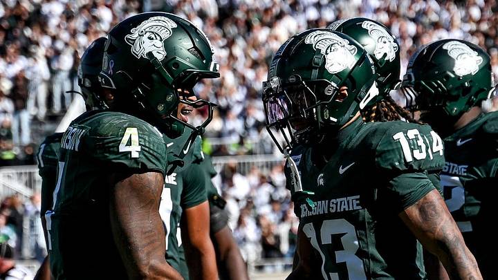 Michigan State’s Chrishon McCray, right, celebrates his touchdown with Jaziun Patterson against Northwestern during the fourth quarter on Saturday, Oct. 17, 2026, at Spartan Stadium in East Lansing.