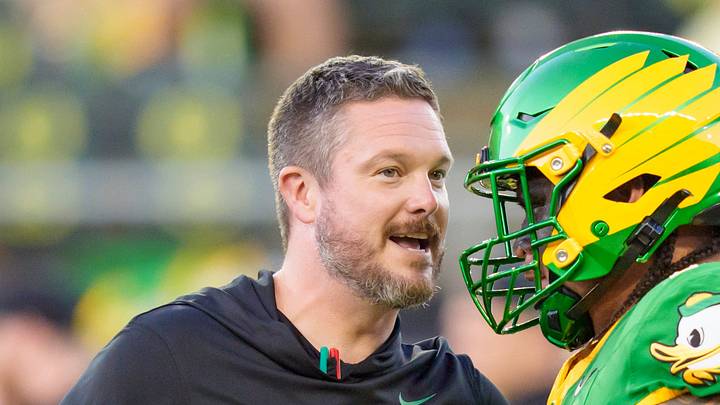 Sept. 18, 2026; Eugene, Oregon; Oregon Ducks coach Dan Lanning talks to offensive lineman Dave Iuli in a game versus the Portland State Vikings at Autzen Stadium. Sept. 18, 2026; Eugene, Oregon; Oregon Ducks coach Dan Lanning talks to offensive lineman Dave Iuli in a game versus the Portland State Vikings at Autzen Stadium.