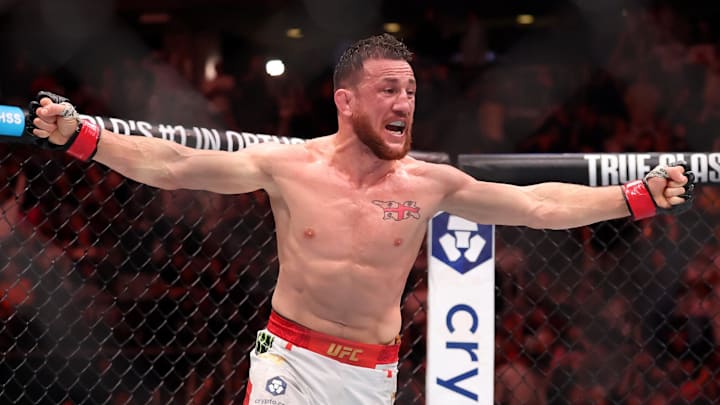Jun 7, 2025; Newark, New Jersey, UNITED STATES; Merab Dvalishvili (red gloves) fights Sean O’Malley (blue gloves) in a bantamweight title fight during UFC 316 at Prudential Center. Mandatory Credit: Vincent Carchietta-Imagn Images