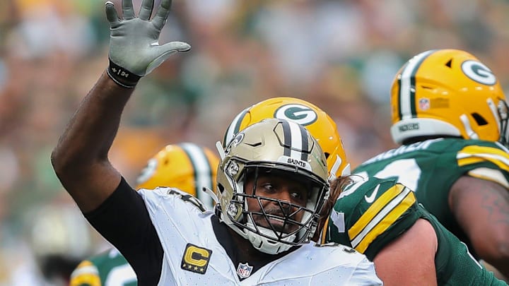 New Orleans Saints defensive end Cameron Jordan (94) rushes Green Bay Packers quarterback Jordan Love in 2023.