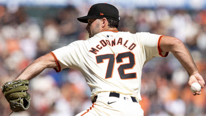 Sep 29, 2024; San Francisco, California, USA; San Francisco Giants pitcher Trevor McDonald (72) delivers a pitch against the St. Louis Cardinals during the seventh inning during his Major League debut at Oracle Park.