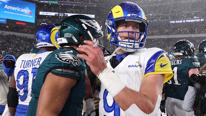 Jan 19, 2025; Philadelphia, Pennsylvania, USA; Philadelphia Eagles quarterback Jalen Hurts (1) greets Los Angeles Rams quarterback Matthew Stafford (9) after their game in a 2025 NFC divisional round game at Lincoln Financial Field. Mandatory Credit: Bill Streicher-Imagn Images
