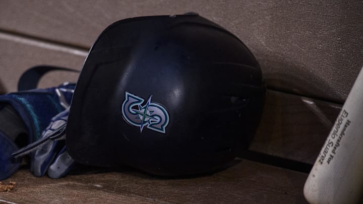 Jun 5, 2022; Arlington, Texas, USA; A view of a Seattle Mariners batting helmet and logo during the game between the Texas Rangers and the Seattle Mariners at Globe Life Field. Mandatory Credit: Jerome Miron-Imagn Images Jun 5, 2022; Arlington, Texas, USA; A view of a Seattle Mariners batting helmet and logo during the game between the Texas Rangers and the Seattle Mariners at Globe Life Field. Mandatory Credit: Jerome Miron-Imagn Images