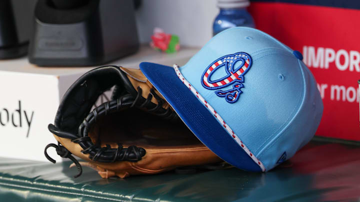 Jul 4, 2025; Atlanta, Georgia, USA; A detailed view of the Baltimore Orioles 4th of July hat in the dugout against the Atlanta Braves in the third inning at Truist Park. Jul 4, 2025; Atlanta, Georgia, USA; A detailed view of the Baltimore Orioles 4th of July hat in the dugout against the Atlanta Braves in the third inning at Truist Park.