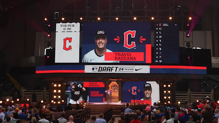 Jul 14, 2024; Ft. Worth, TX, USA;  The Cleveland Guardians select Travis Bazzana with the first pick during the first round of the MLB Draft at Cowtown Coliseum. Mandatory Credit: Kevin Jairaj-Imagn Images