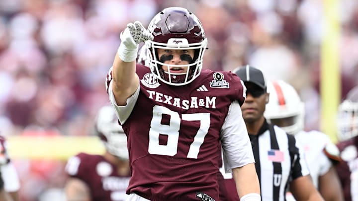 Texas A&M Aggies tight end Nate Boerkircher (87) celebrates a first down against the Miami Hurricanes during first quarter of the first round game of the CFP National Playoff at Kyle Field. 