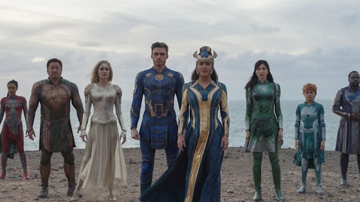 (L-R): Kingo (Kumail Nanjiani), Makkari (Lauren Ridloff), Gilgamesh (Don Lee), Thena (Angelina Jolie), Ikaris (Richard Madden), Ajak (Salma Hayek), Sersi (Gemma Chan), Sprite (Lia McHugh), Phastos (Brian Tyree Henry) and Druig (Barry Keoghan) in Marvel Studios' ETERNALS. Photo courtesy of Marvel Studios. ©Marvel Studios 2021. All Rights Reserved.