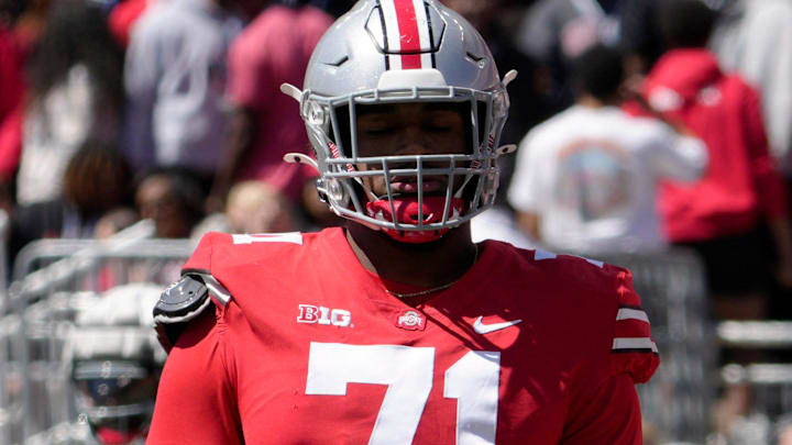 April 13, 2024; Columbus, Ohio, USA; 
Ohio State Buckeyes offensive tackle Josh Simmons (71) competes during the first half of the LifeSports spring football game at Ohio Stadium on Saturday.