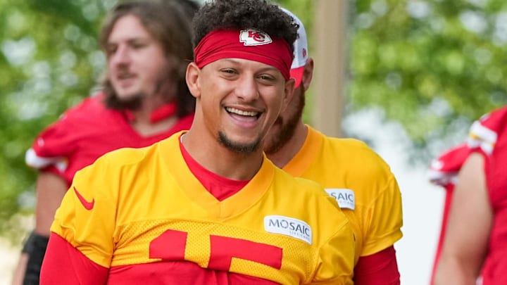Kansas City Chiefs quarterback Patrick Mahomes (15) and quarterback Ian Book (2) laugh while walking from the locker room to the fields prior to training camp at Missouri Western State University.