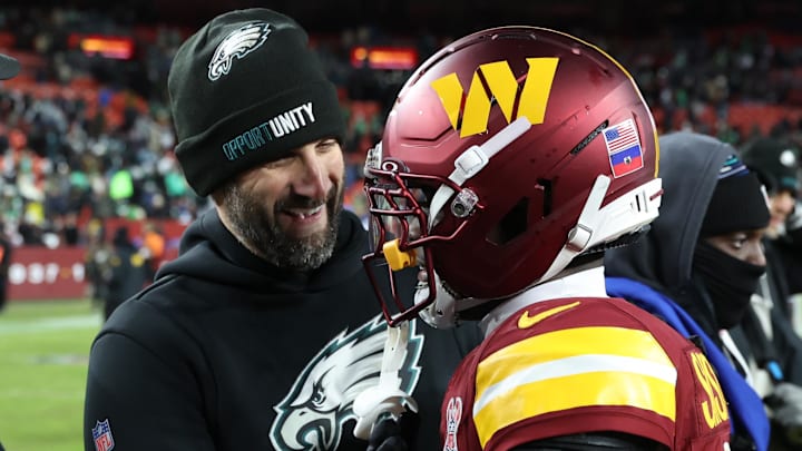 Dec 20, 2025; Landover, Maryland, USA; Philadelphia Eagles head coach Nick Sirianni greets Washington Commanders cornerback Mike Sainristil (0) after the game at Northwest Stadium. Mandatory Credit: Geoff Burke-Imagn Images