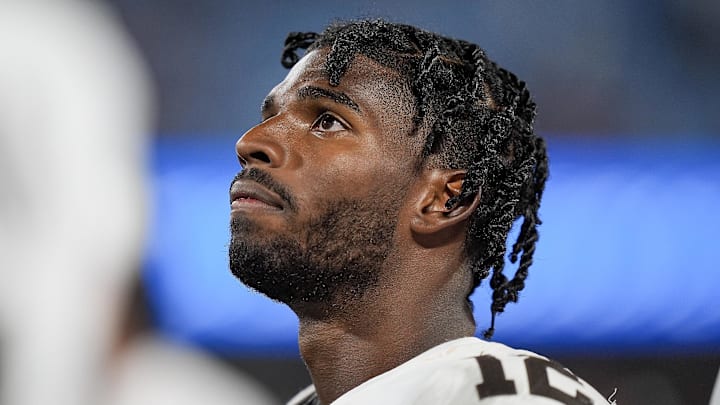 Aug 8, 2025; Charlotte, North Carolina, USA; Cleveland Browns quarterback Shedeur Sanders (12) on the sideline during the second half against the Carolina Panthers at Bank of America Stadium. 