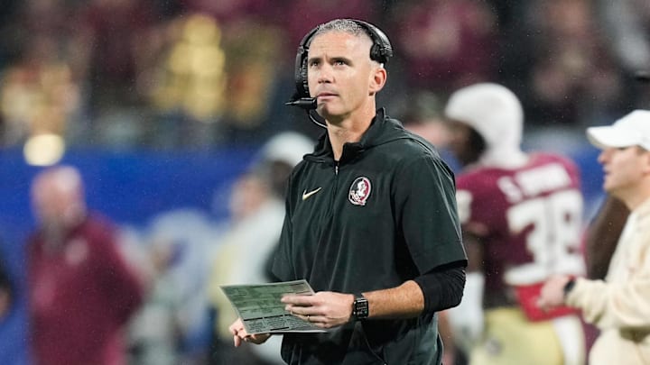 Dec 2, 2023; Charlotte, NC, USA; Florida State Seminoles head coach Mike Norvell looks on during the fourth quarter against the Louisville Cardinals at Bank of America Stadium. Mandatory Credit: Jim Dedmon-Imagn Images Dec 2, 2023; Charlotte, NC, USA; Florida State Seminoles head coach Mike Norvell looks on during the fourth quarter against the Louisville Cardinals at Bank of America Stadium. Mandatory Credit: Jim Dedmon-Imagn Images
