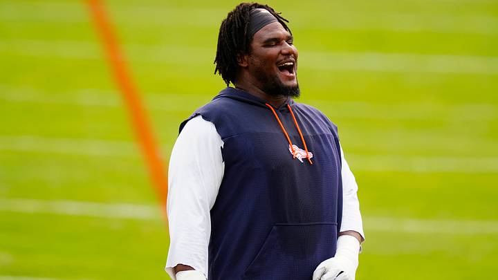 Aug 3, 2026; Englewood, CO, USA; Denver Broncos defensive tackle Malcolm Roach (97) reacts before the start of training camp at Broncos Park. Aug 3, 2026; Englewood, CO, USA; Denver Broncos defensive tackle Malcolm Roach (97) reacts before the start of training camp at Broncos Park.