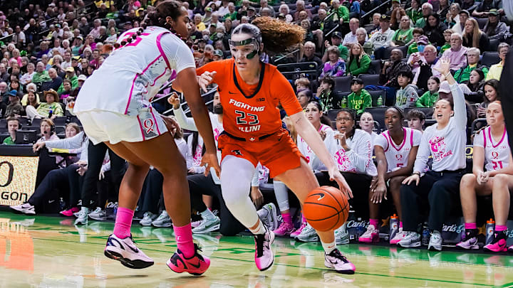 Illinois forward Berry Wallace (23) makes a move against Oregon forward Ehis Etute (35) in the Illini's 76-73 loss to the Ducks on Wednesday in Eugene, Oregon. Illinois forward Berry Wallace (23) makes a move against Oregon forward Ehis Etute (35) in the Illini's 76-73 loss to the Ducks on Wednesday in Eugene, Oregon.